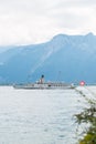 The oldest Belle Epoque restored vintage paddle steamboat Montreux cruising along the Swiss shore of Lake Geneva Lac Leman, Vaud