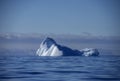 Deep blue ancient glacial iceberg under the midnight sun,  Antarctica Royalty Free Stock Photo