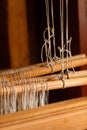 Oldfashioned thread on old spindle, spinning wheel