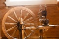 Oldfashioned wooden distaff, spindle, spinning wheel
