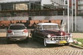 Oldtimer veteran Cadillac car parked on pave stones on a street