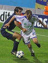 Oleg Gusev of Dynamo Kyiv (R) and Oleguer of AFC A Royalty Free Stock Photo