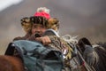 Kazakh Eagle Hunter traditional clothing, during annual national competition with birds