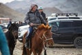 Local mongolian people during annual national competition with birds of prey BERKUTCHI of West Mongolia