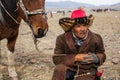 Local mongolian people during annual national competition with birds of prey BERKUTCHI of West Mongolia