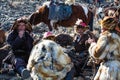 Local mongolian people during annual national competition with birds of prey BERKUTCHI of West Mongolia