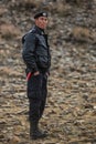 Local mongolian policeman during annual national competition with birds of prey BERKUTCHI of West Mongolia