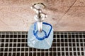 Spring water. Pouring water from a well into a plastic bottle Royalty Free Stock Photo