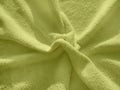 Olive green Terry towel, a simple example of the texture of a soft, fleecy fabric, background Royalty Free Stock Photo