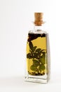 Olive oil 7 herbs in bottle Royalty Free Stock Photo