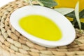 Olive oil Bottle and bowl plate with olive branch. Virgin olive oil. Natural olive oil, healthy food. Royalty Free Stock Photo