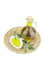 Olive oil Bottle and bowl plate with olive branch. Virgin olive oil. Natural olive oil, healthy food. Royalty Free Stock Photo