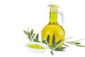 Olive oil Bottle and bowl plate with olive branch. Virgin olive oil. Natural olive oil, healthy food. Royalty Free Stock Photo