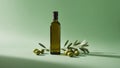Olive Oil Bottle with Olive Branches and Green Olives on Green Background. Royalty Free Stock Photo