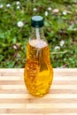 Olive oil bottle on cutting board