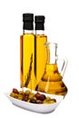Olive oil bottles and olives. Royalty Free Stock Photo