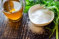 Olive oil, bowl with coarse sea salt, herbs of herbs, close-up Royalty Free Stock Photo