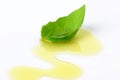 Olive oil drizzle and basil leaf