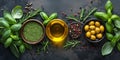 Olive oil with fresh herbs and spices rosemary and basil leaf, pepper and green olives, mediterranean food ingredients Royalty Free Stock Photo