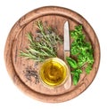 Olive oil with fresh herbs thyme, basil and rosemary Royalty Free Stock Photo