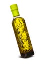Olive oil in a glass bottle with herbs on an isolated background. High quality first pressing oil. Spices and herbs in a bottle of Royalty Free Stock Photo