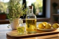 Olive oil in glass transparent bottles. Organic olive oil on a white wooden table.