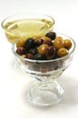 Olive oil with green, black and brown olives Royalty Free Stock Photo