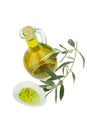 Olive oil with herbs Bottle and bowl plate with olive branch. Virgin olive oil. Natural olive oil, healthy food. Royalty Free Stock Photo