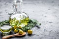 Olive oil with ingredients on kitchen table background mockup Royalty Free Stock Photo