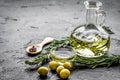 Olive oil with ingredients on kitchen table background mockup Royalty Free Stock Photo