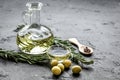Olive oil with ingredients on kitchen table background mockup Royalty Free Stock Photo