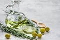 Olive oil with ingredients on kitchen table background mockup Royalty Free Stock Photo