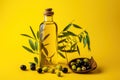 Olive oil and olives. Bottle of oil. olives twigs and pepper on yellow.