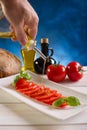 Olive oil over Slice tomato