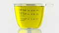 Olive Oil poured into 250 ml measuring cup