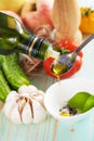 Olive oil pouring in a spoon Royalty Free Stock Photo