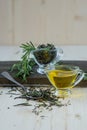 Olive oil with rosemary in a glass