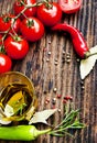 Olive Oil,Rosemary, Tomatoes and Peppercorns Frame Royalty Free Stock Photo