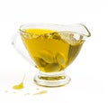 Olive oil splash in gravy boat Royalty Free Stock Photo