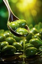 Olive oil in a spoon with green olive fruits, culinary background