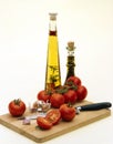 Olive oil, tomatoes and garlic light Royalty Free Stock Photo