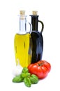 Olive oil, vinegar and vegetables Royalty Free Stock Photo