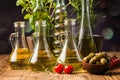 Olive oils in bottles with ingriedients Royalty Free Stock Photo