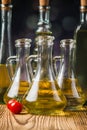 Olive oils in bottles with ingriedients Royalty Free Stock Photo