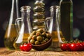 Olive oils in bottles with ingriedients Royalty Free Stock Photo