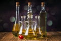 Olive oils in bottles with ingriedients Royalty Free Stock Photo