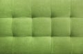 Olive suede leather background, classic checkered pattern for furniture, wall, headboard