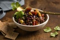 Olive tapenade with herbs and olive oil in a rustic bowl Royalty Free Stock Photo