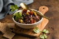 Olive tapenade with herbs and olive oil in a rustic bowl Royalty Free Stock Photo