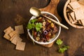 Olive tapenade with herbs and olive oil in a rustic bowl Royalty Free Stock Photo